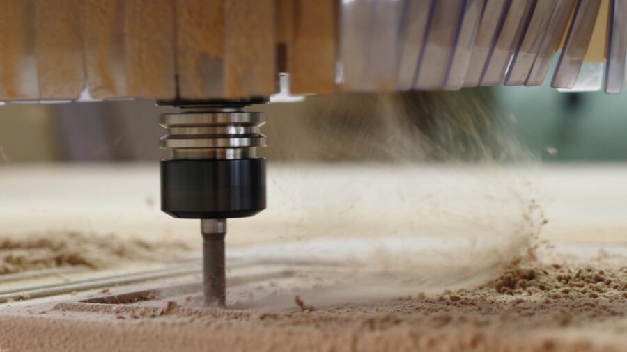 Chipboard,Milling,On,The,Machine,With,Cnc,Closeup.,Cuts,Curly